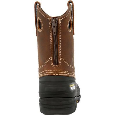 Brown work boot with black sole on a white background