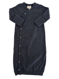 Dark gray baby sleep sack with colorful speckles and snap buttons, designed for comfort and ease.