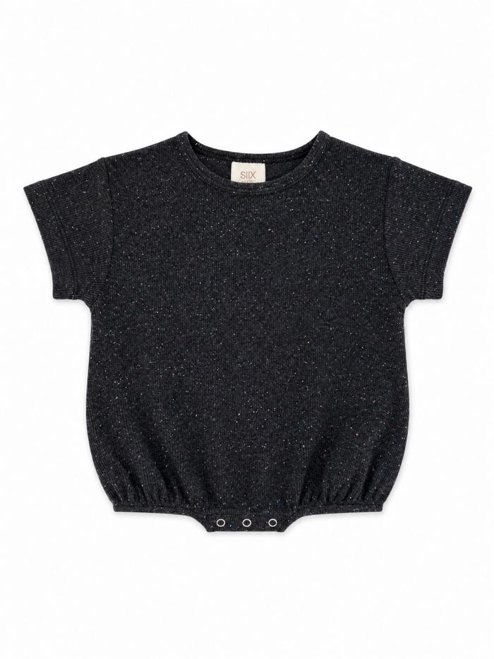 Black short-sleeve baby bodysuit with subtle colorful specks and snap closures at the bottom.