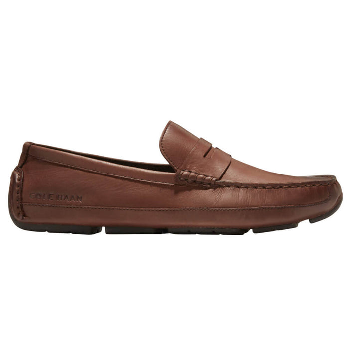 Brown leather loafer shoe on a white background