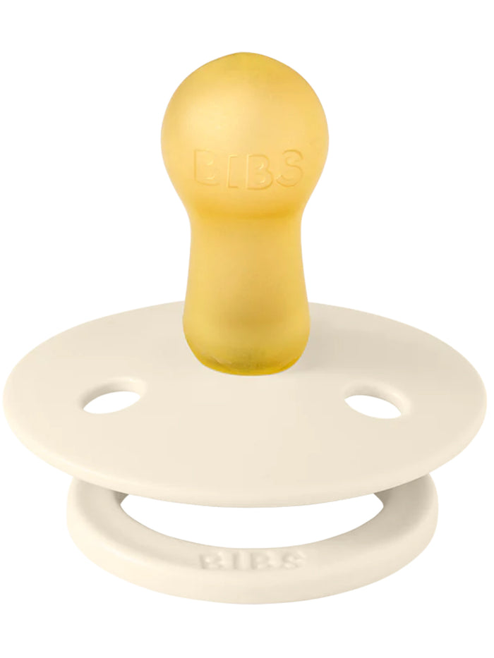 BIBS pacifier with a yellow bulb and white shield, designed for infants.