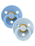 Two blue pacifiers with an orange button, designed for infants, featuring a round shield and holes for ventilation.