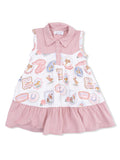 Girls' sleeveless dress with pink collar, featuring a playful rodeo-themed print and ruffled skirt.