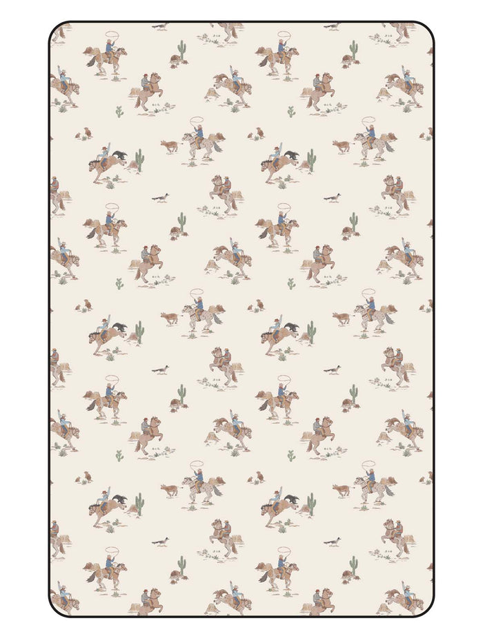 Cowboys on horseback in a desert scene with cacti and animals in a repeating pattern on a light background.