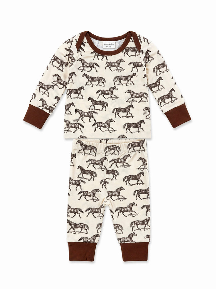 Child's pajama set featuring a horse pattern, with a long-sleeve shirt and matching pants in soft fabric.