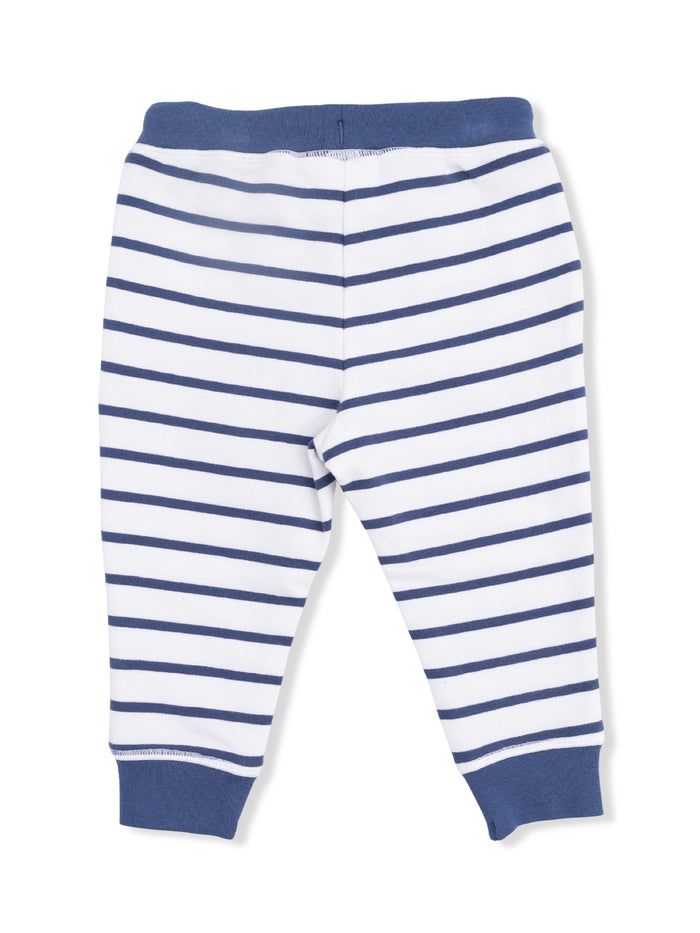 Striped baby pants in white and navy blue, featuring elastic waistband and cuffs.