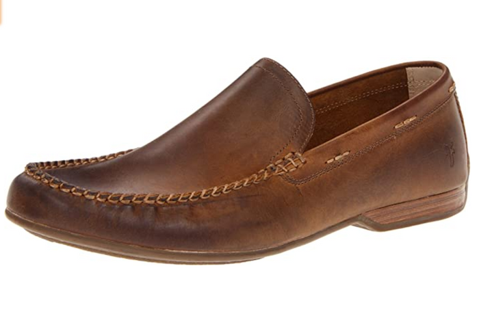 Brown loafer shoe on a white background