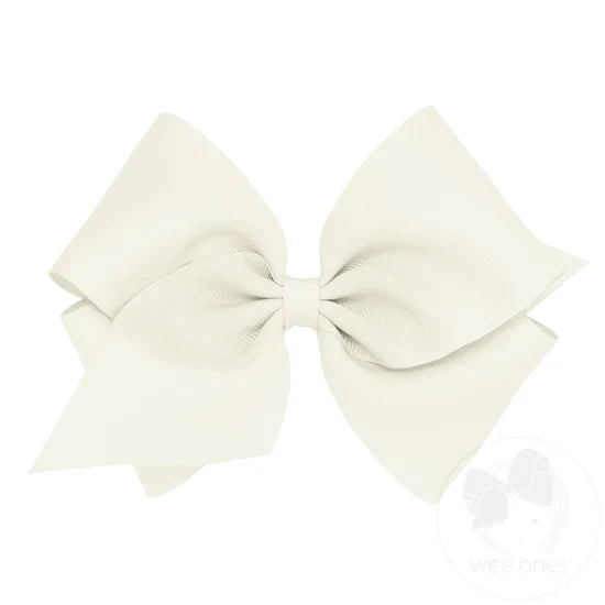 Large cream-colored bow on a white background