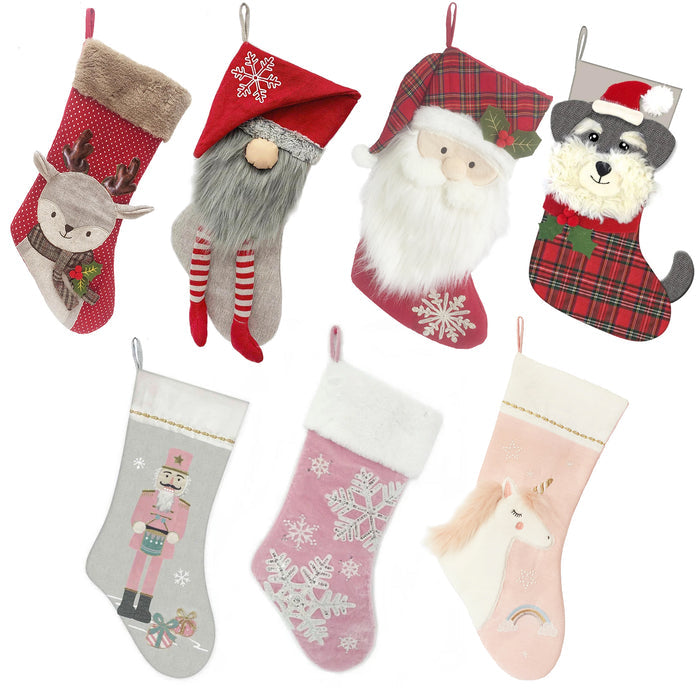 Colorful Christmas stockings featuring designs like deer, Santa, unicorns, and more, arranged in a festive display.