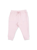 Light pink sweatpants with elastic waistband and drawstring, featuring two front pockets.