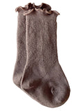 Brown ribbed socks with a ruffled top, designed for comfort and style.