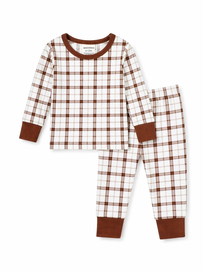 Brown and white plaid children's pajamas set, featuring long sleeves and matching pants.