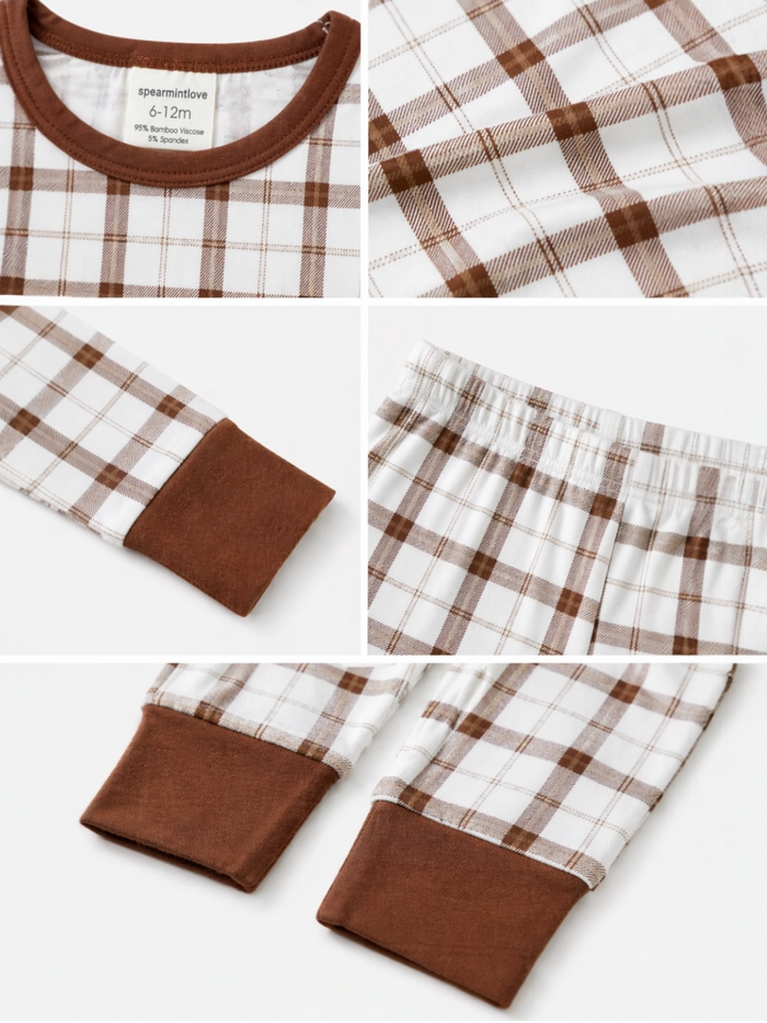 Plaid infant pajamas with brown accents, featuring a label for size 6-12 months made of bamboo viscose and spandex.