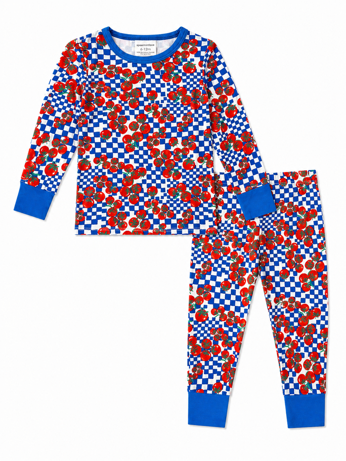 Blue and white checkered pajama set with red tomato patterns for infants, includes a long-sleeve top and pants.