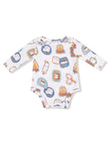 White long-sleeve baby onesie with colorful s'mores-themed cartoon patterns.