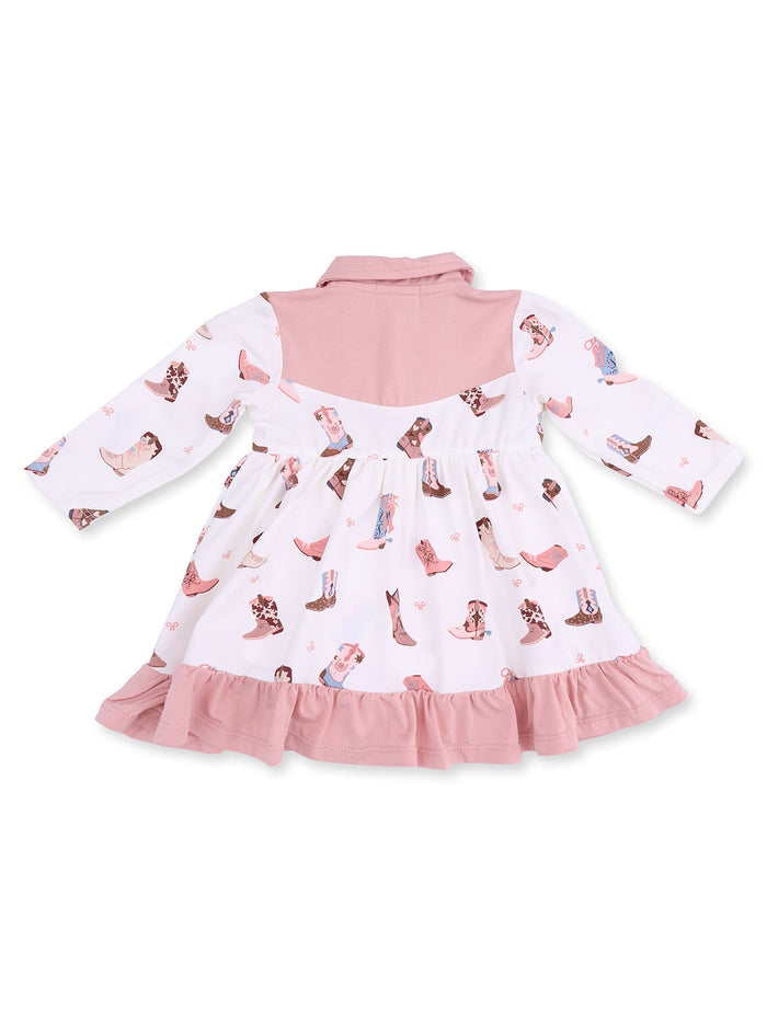 Back view of a children’s dress with a pink collar and patterned boots on a white fabric. Flared hem with ruffle details.