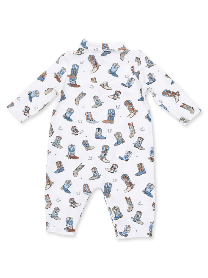 White baby onesie adorned with colorful cowboy boots and horse shoes pattern.