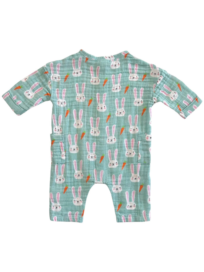A cute children's romper with a bunny and carrot pattern on a mint green background.