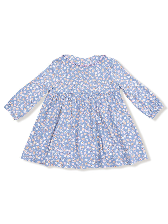Blue floral dress with long sleeves and a round collar, featuring a gathered waist and flowy skirt.