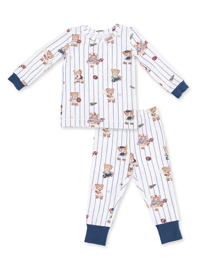 Children's pajama set featuring bear illustrations on white striped background with navy accents.