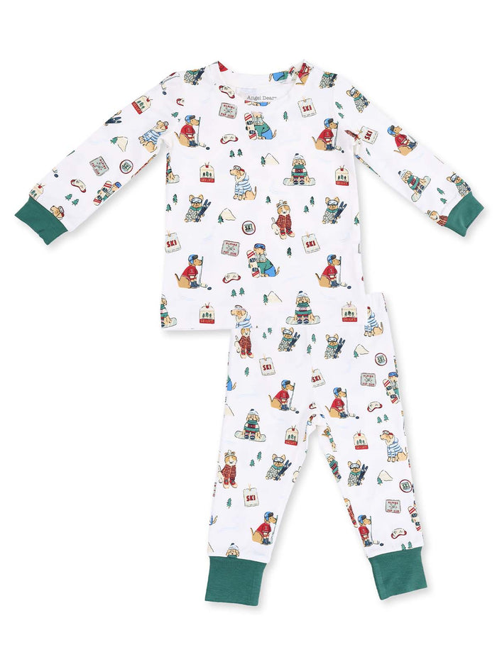 Kids' pajama set featuring playful ski-themed animal prints in bright colors on a white background.