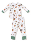 Kids' pajama set featuring animal prints of bears, foxes, and owls on a white background with green cuffs.