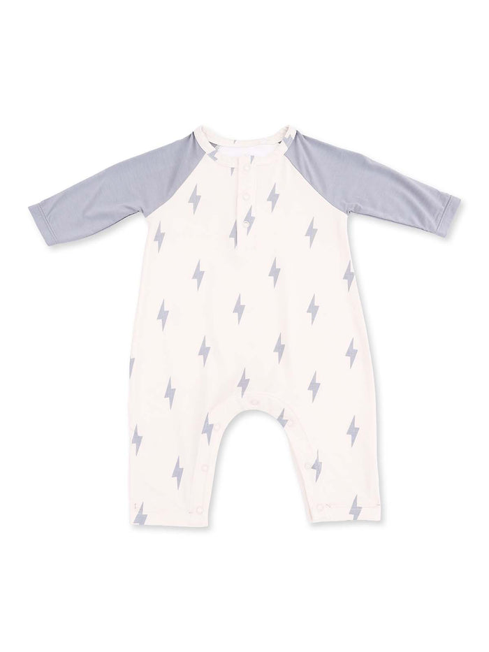 Light-colored baby romper with gray sleeves and a lightning bolt pattern. Perfect for stylish infant wear.