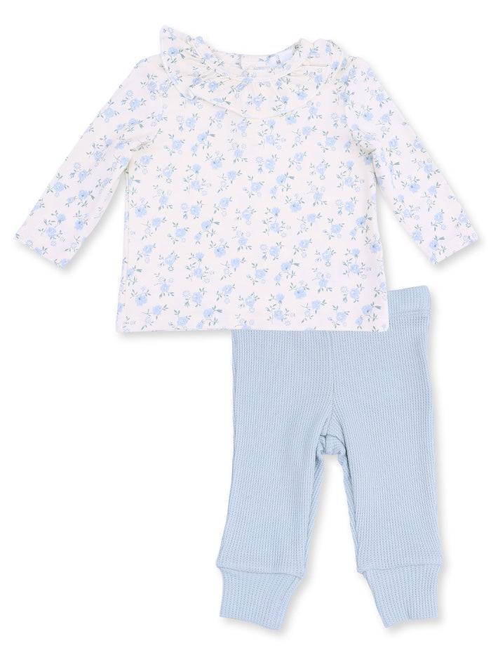 Light floral long-sleeve shirt with ruffle collar and soft blue pants, perfect for infants.