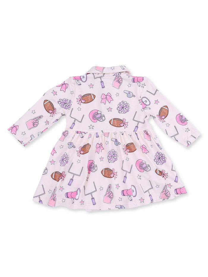 Back view of a pink dress with playful sports and cheer-themed illustrations. Perfect for young fans!