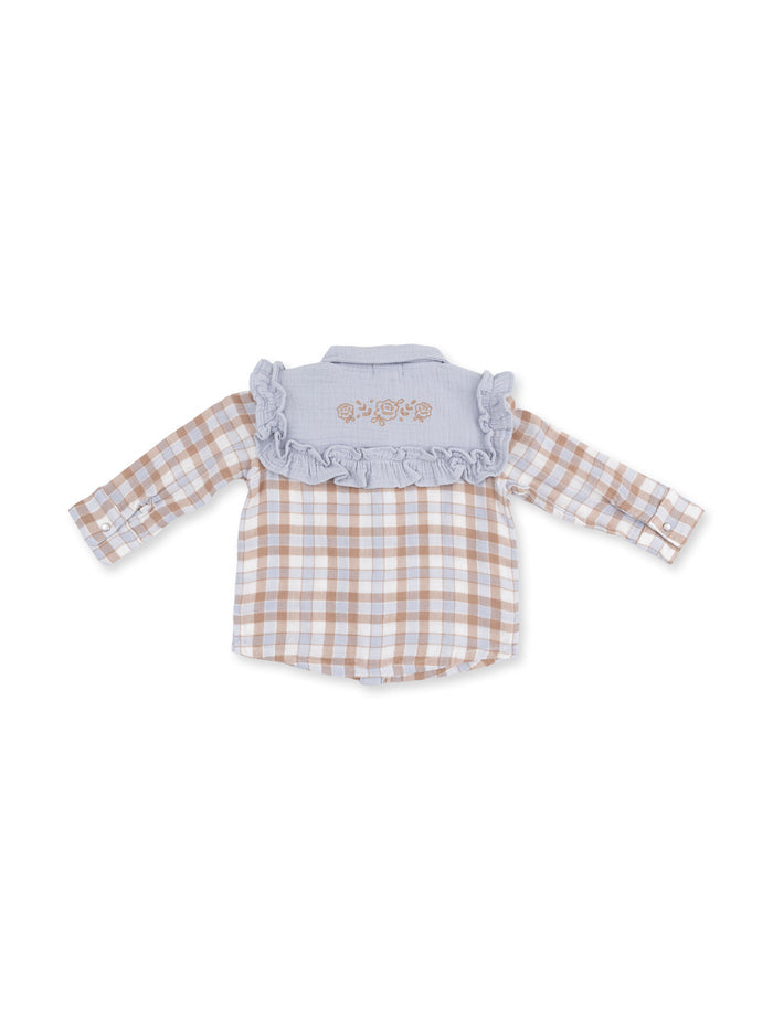 Back view of a checked shirt featuring ruffled collar and floral embroidery in soft neutral tones.