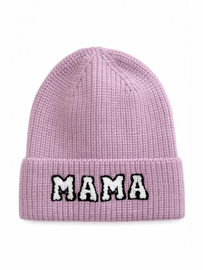 Pink knit beanie hat with "MAMA" embroidered in bold black and white letters on the front.