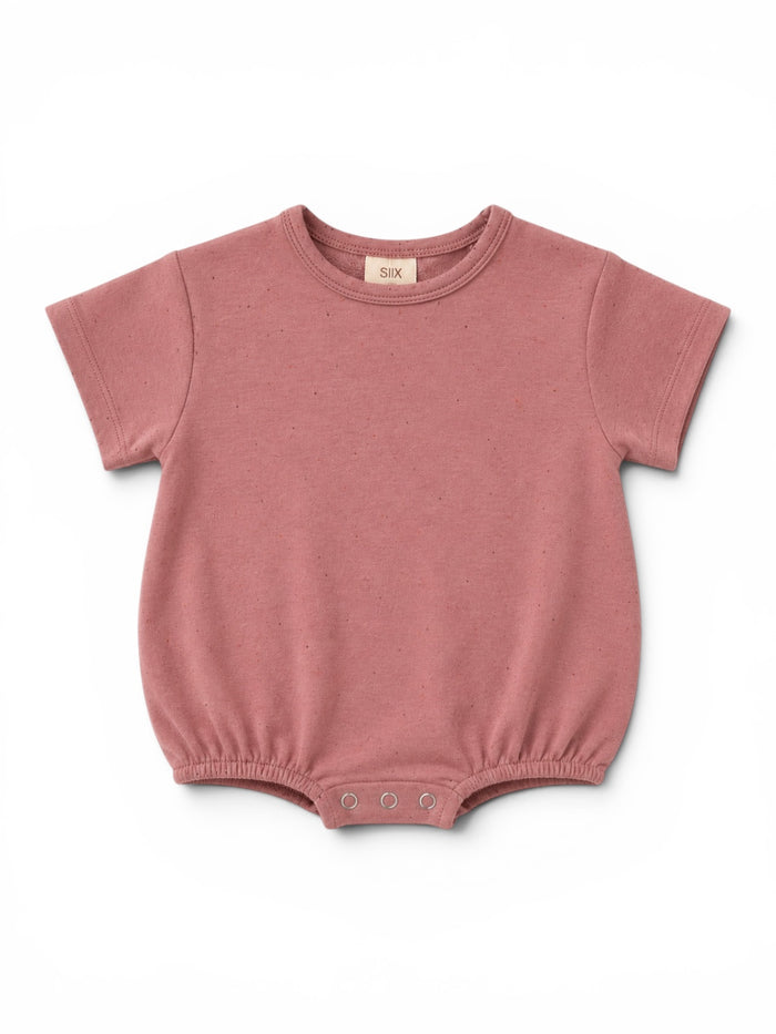 Pink baby bodysuit with short sleeves and snap closure at the bottom displayed on a white background.