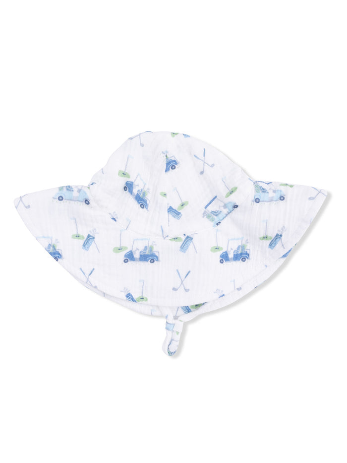 Child's sun hat featuring a playful golf-themed print with blue and green motifs on a white background.