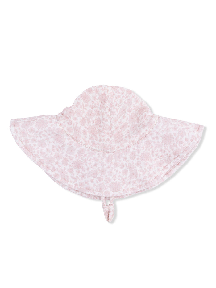 Pink floral sun hat with wide brim and chin strap, designed for sun protection.