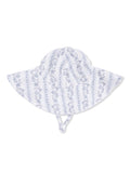 Floral patterned wide-brim hat with ties, ideal for sun protection.