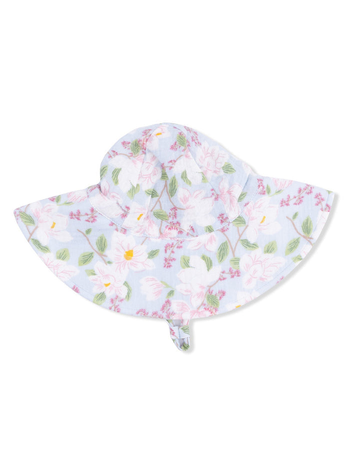 Floral sun hat with wide brim, featuring pastel colors and a light blue background.