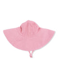 Pink children's sun hat with a wide brim and adjustable chin strap, viewed from the back.