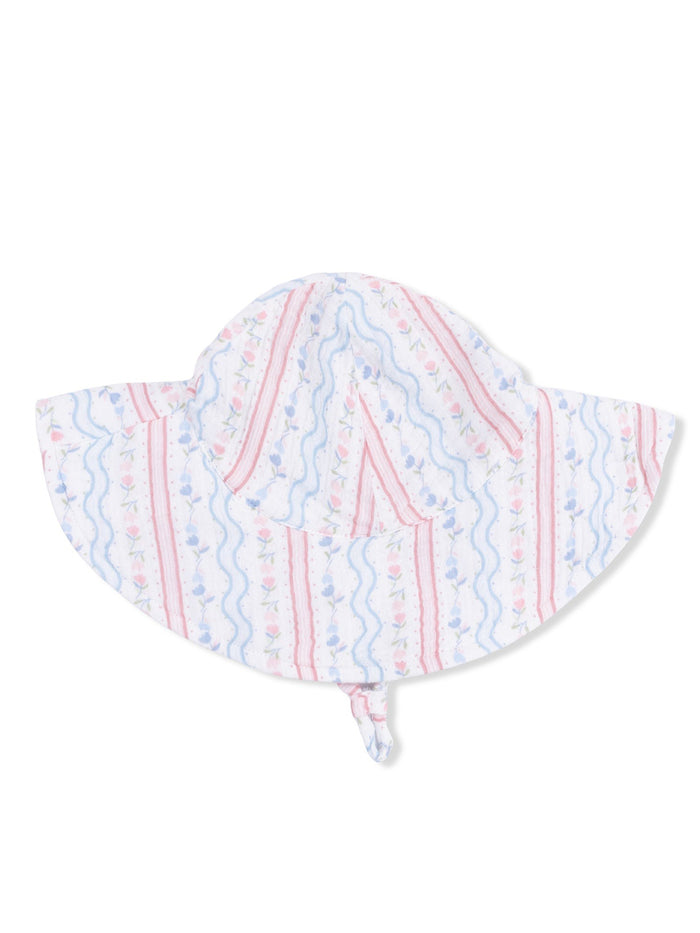 White sun hat with pink and blue floral stripes, featuring a wide brim and a adjustable chin strap.