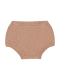 Knit baby bloomers in soft beige with a ribbed waistband and leg openings.
