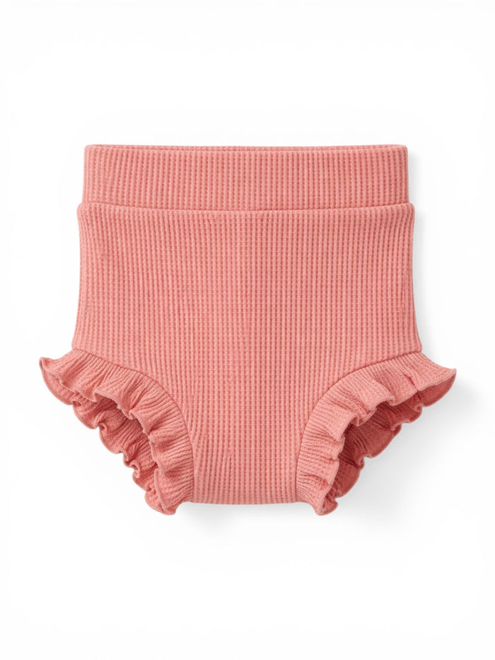 Pink ribbed diaper cover with ruffled edges, designed for infants and toddlers.