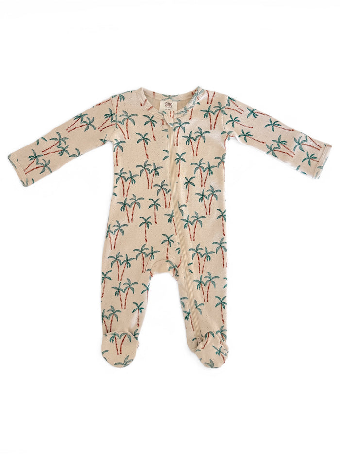 Beige baby onesie with colorful palm tree pattern and zipper closure, suitable for warm weather wear.