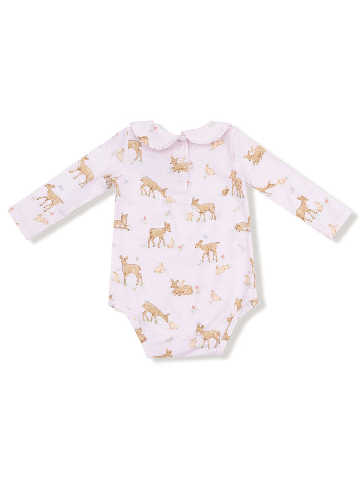 Light pink long-sleeve onesie featuring adorable deer and bunny illustrations. Perfect for babies.