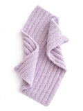 Lavender, textured scarf draped artistically, showcasing its soft and cozy fabric.