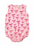 Pink infant bodysuit with a pattern of bright pink bows on a light background.