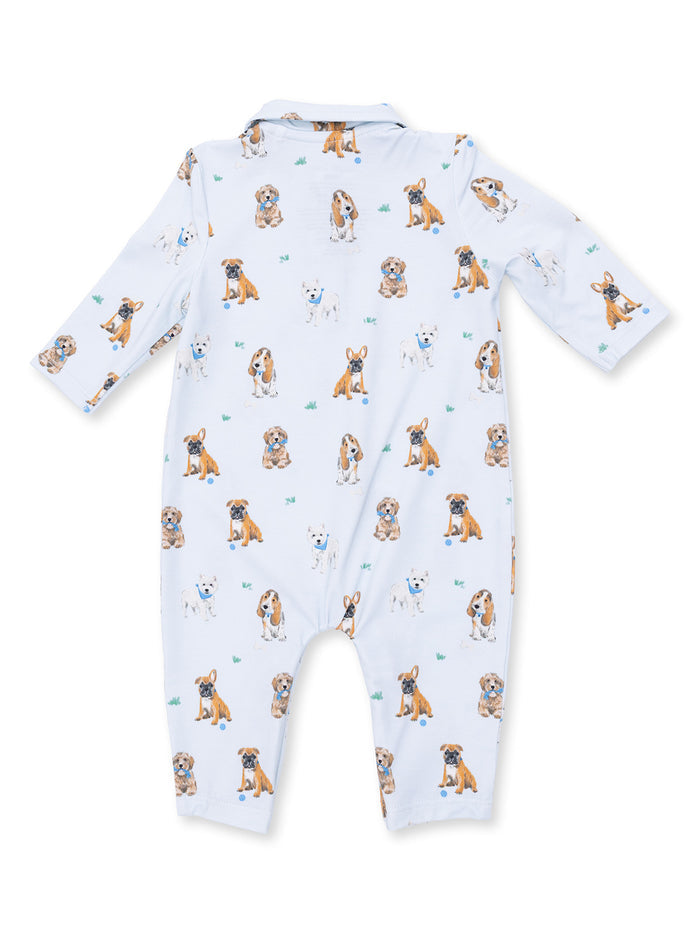 Dog-patterned baby romper featuring various playful dog illustrations on a light background.