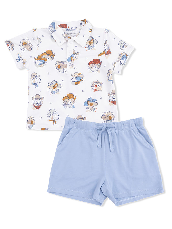 Short-sleeve children's outfit with a dog-patterned shirt and light blue shorts. Perfect for warm weather.