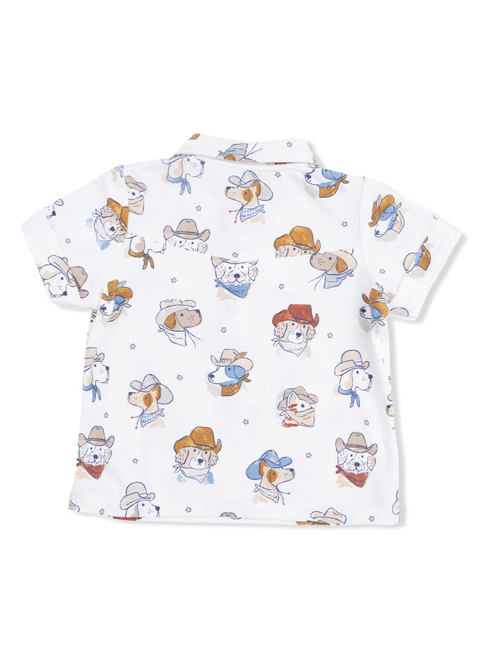 White shirt featuring playful dog illustrations wearing cowboy hats.