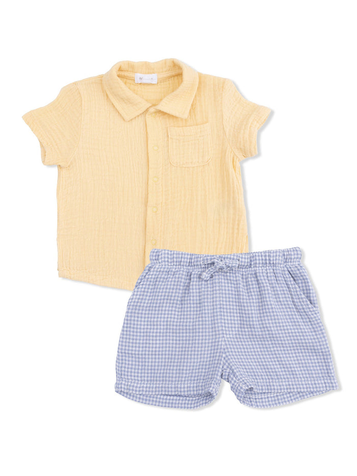 Light yellow collared shirt with chest pocket and blue gingham shorts, perfect for casual summer wear.