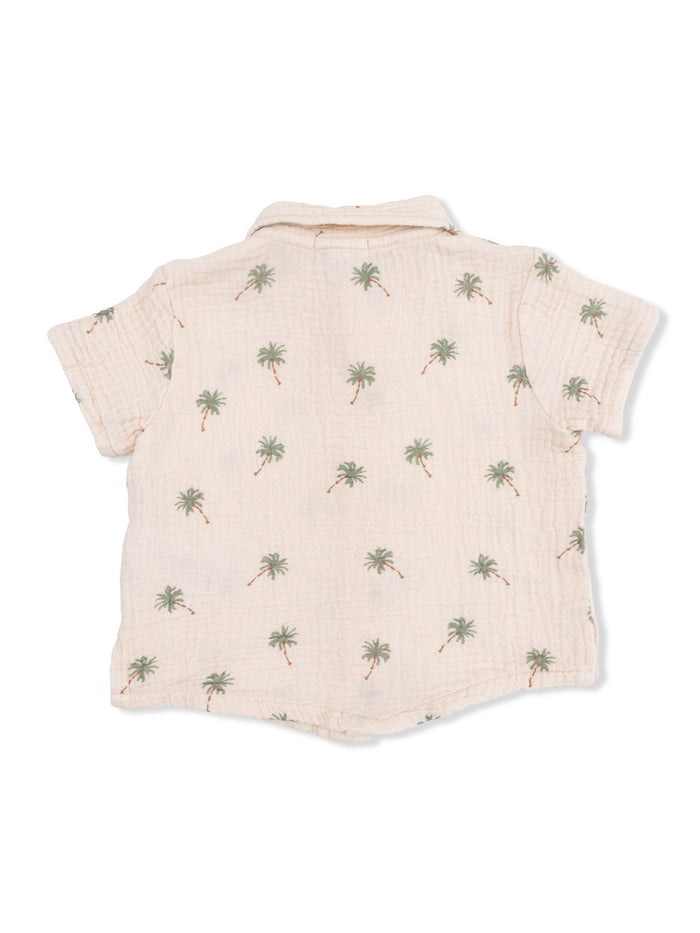 Light beige short-sleeve shirt with palm tree print, view of the back. Perfect for casual summer wear.