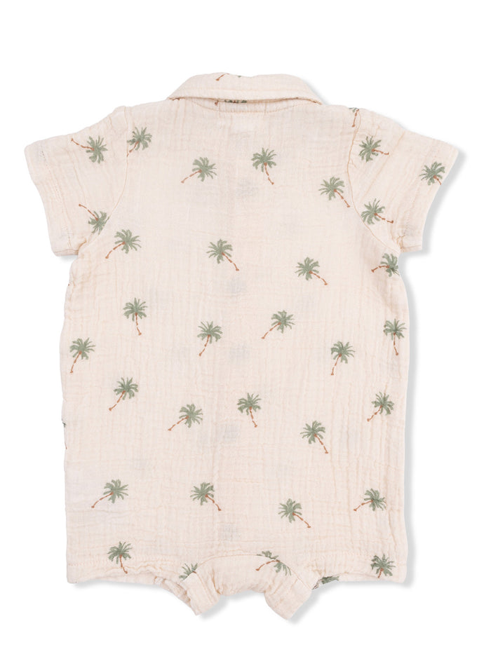 Light-colored infant romper with palm tree print and short sleeves. Ideal for warm weather.